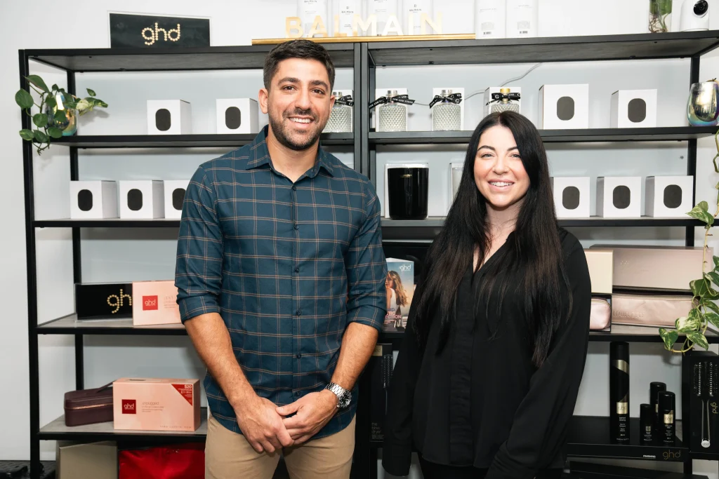 Justin Tomas, small business accountant taking photo with Amanda, Hair and Beauty salon owner